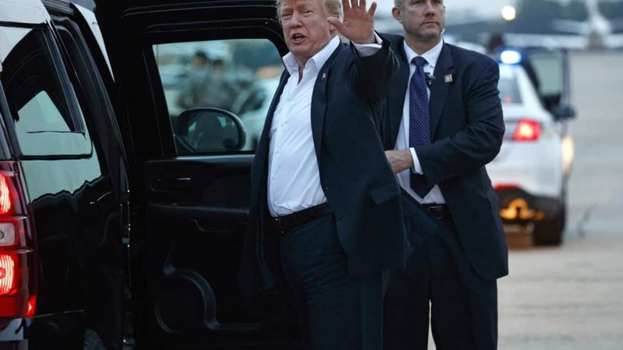 US President Donald Trump arrives back in the US
