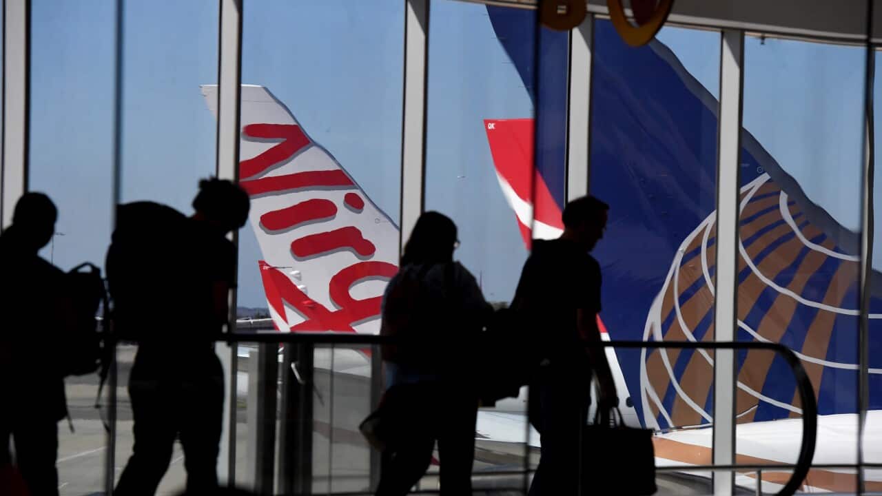 A Virgin Australia plane is seen at Sydney Airport, Wednesday February 28, 2018. Virgin Australia's board has decided against delisting the airline from the ASX following discussions with major shareholders. (AAP Image/Peter Rae) NO ARCHIVING