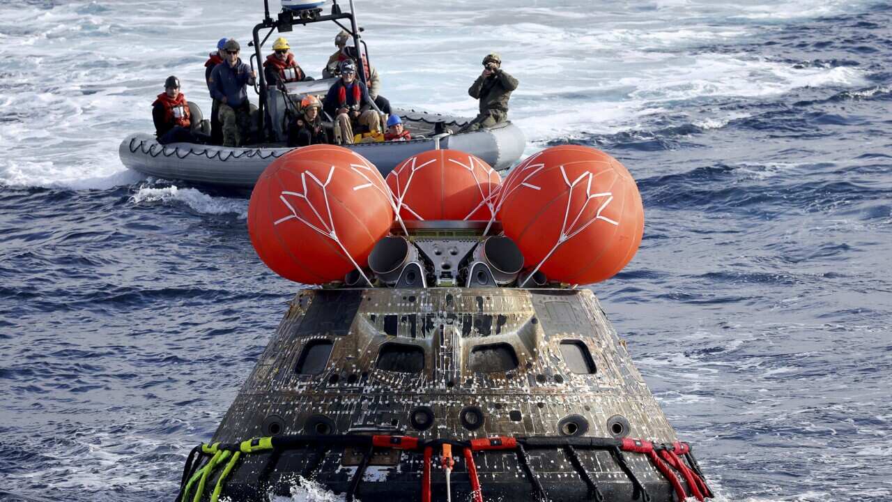 NASA's Orion capsule after it splashed down on Sunday (AAP).jpg