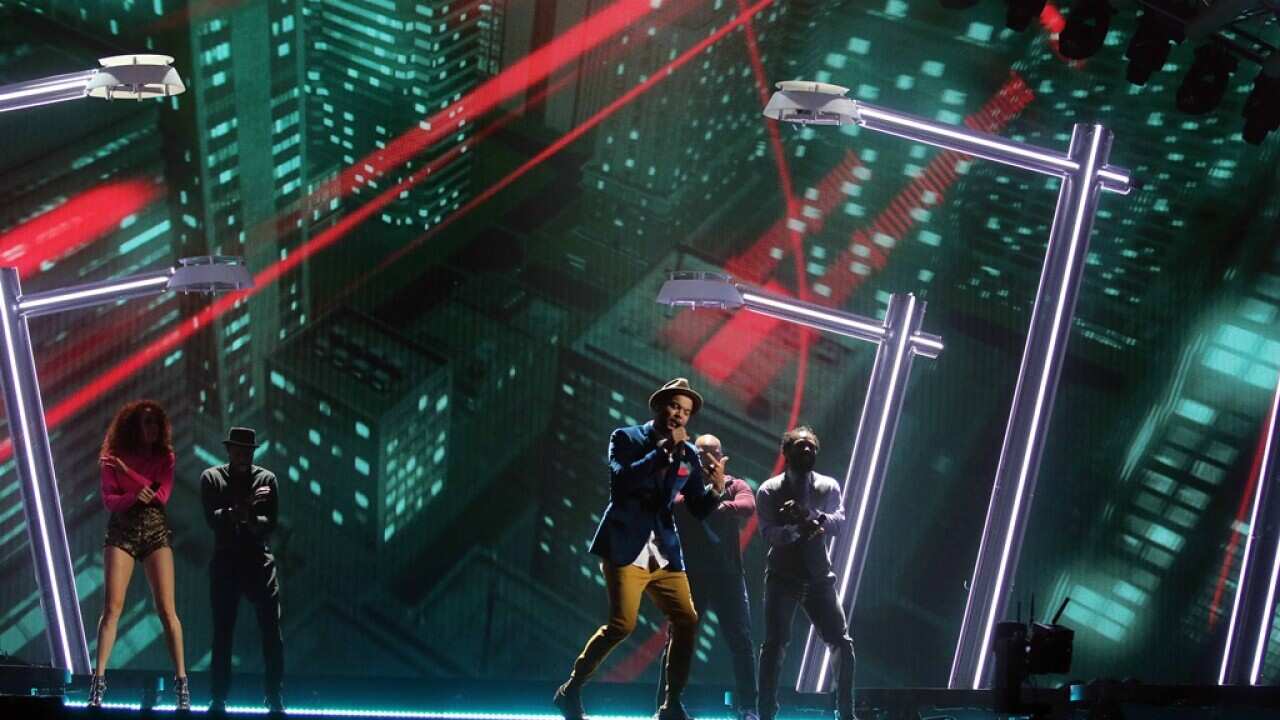 Australias's Guy Sebastian performs the song 'Tonight Again' during a dress rehearsal of the Eurovision Song Contest in Austria's capital Vienna, Wednesday, May 20, 2015. (AP Photo/Ronald Zak)