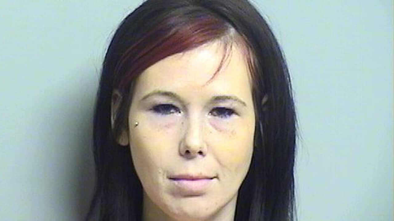 Shaynna Sims. The Oklahoma woman accused of slashing the corpse of her boyfriend's ex-girlfriend at a funeral home last month has is now accused of removing body parts of the deceased woman. (AP)