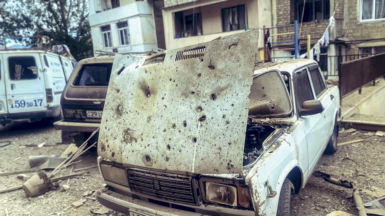 Shelling damaged residential buildings and vehicles in the Karabakh regional capital of Stepnakert.