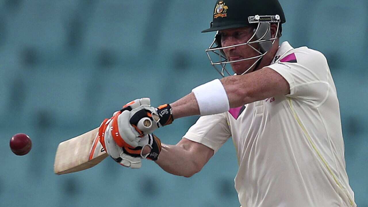 Australia's Brad Haddin drives the ball against India