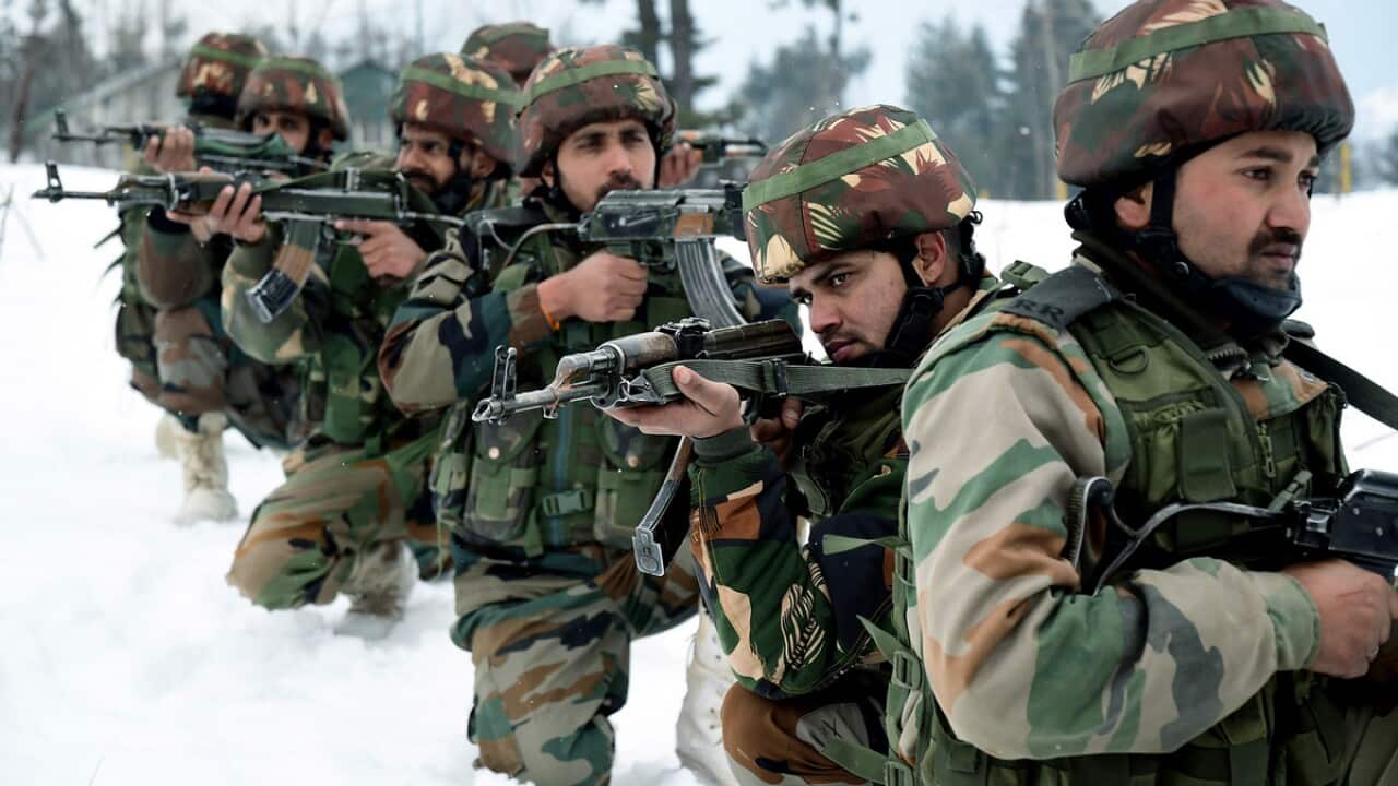 Army Jawans patrolling near the snow-covered border