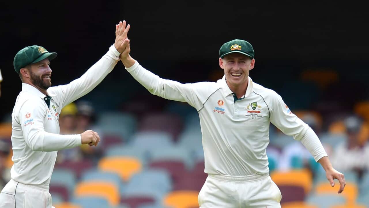 Man-of-the-match Marnus Labuschagne (right) celebrates Australia's win with teammate Matthew Wade