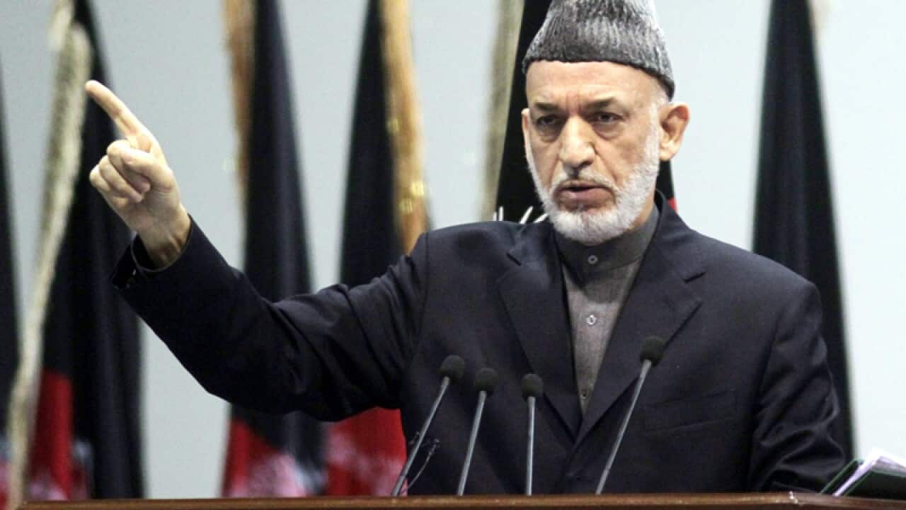 Afghanistan President Hamid Karzai gestures.