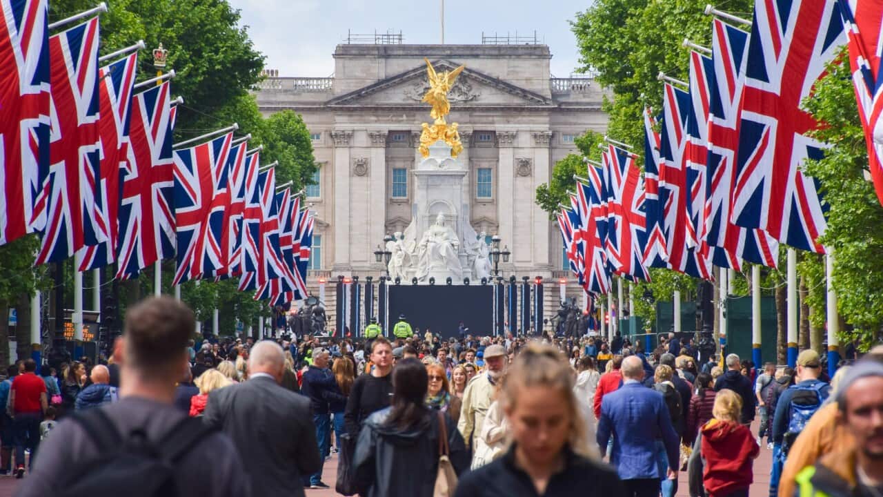 Crowds descend on The Mall as The Queen's Platinum Jubilee preparations near completion at Buckingham Palace