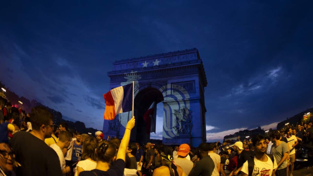 Fans in Paris celebrate France's World Cup triumph