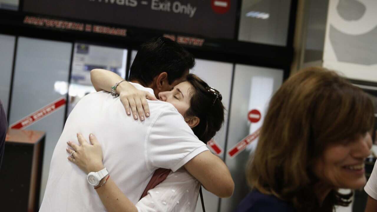 A woman evacuated from Libya