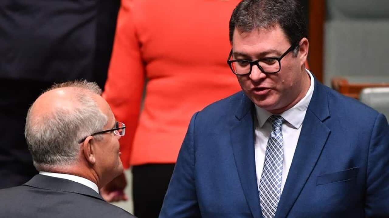 Scott Morrison speaks to Nationals MP George Christensen