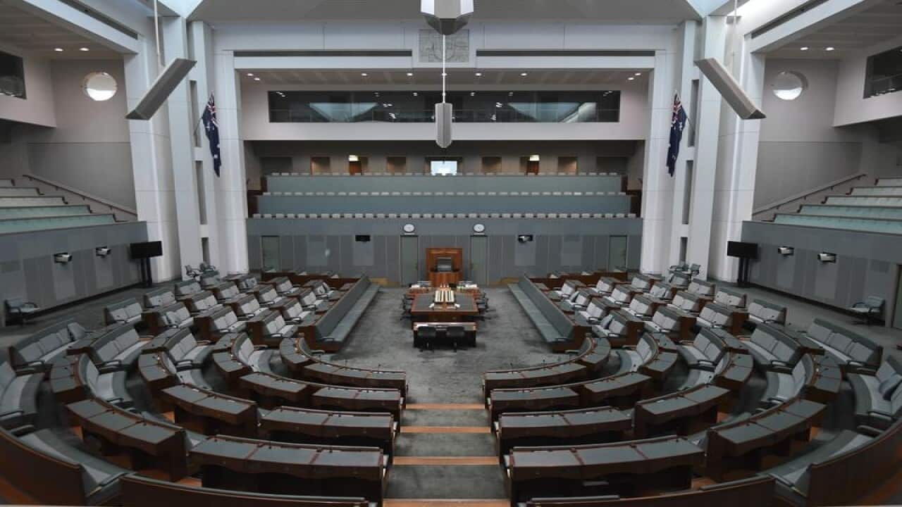 The empty chamber of the House of Representatives