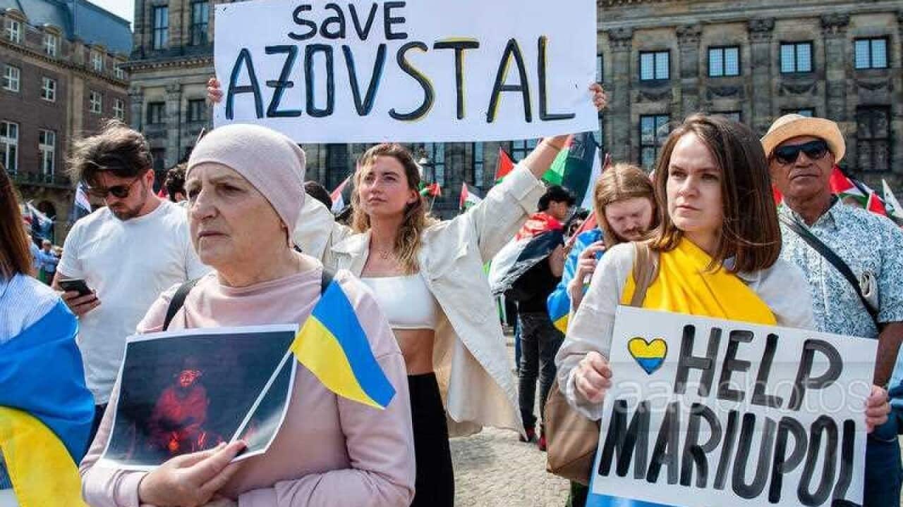 The Ukrainian community in The Netherlands gathered at the Dam square in Amsterdam to demand the extraction of the Ukrainian soldiers trapped in Mariupols Azovstal steel plant.