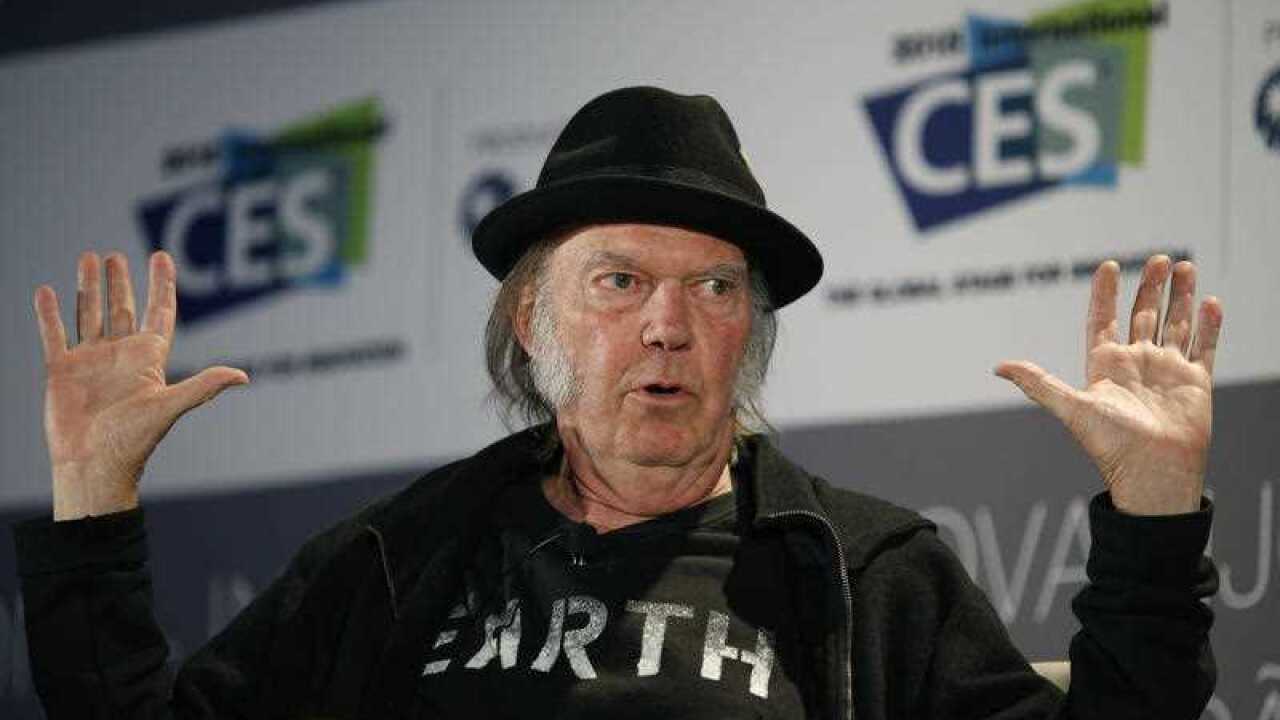 n this Jan. 7, 2015, file photo, Musician Neil Young speaks during a session at the International CES, in Las Vegas. Advocates like Neil Young and major record labels say the format that’s the high end of what’s known as “high-resolution” audio restores t
