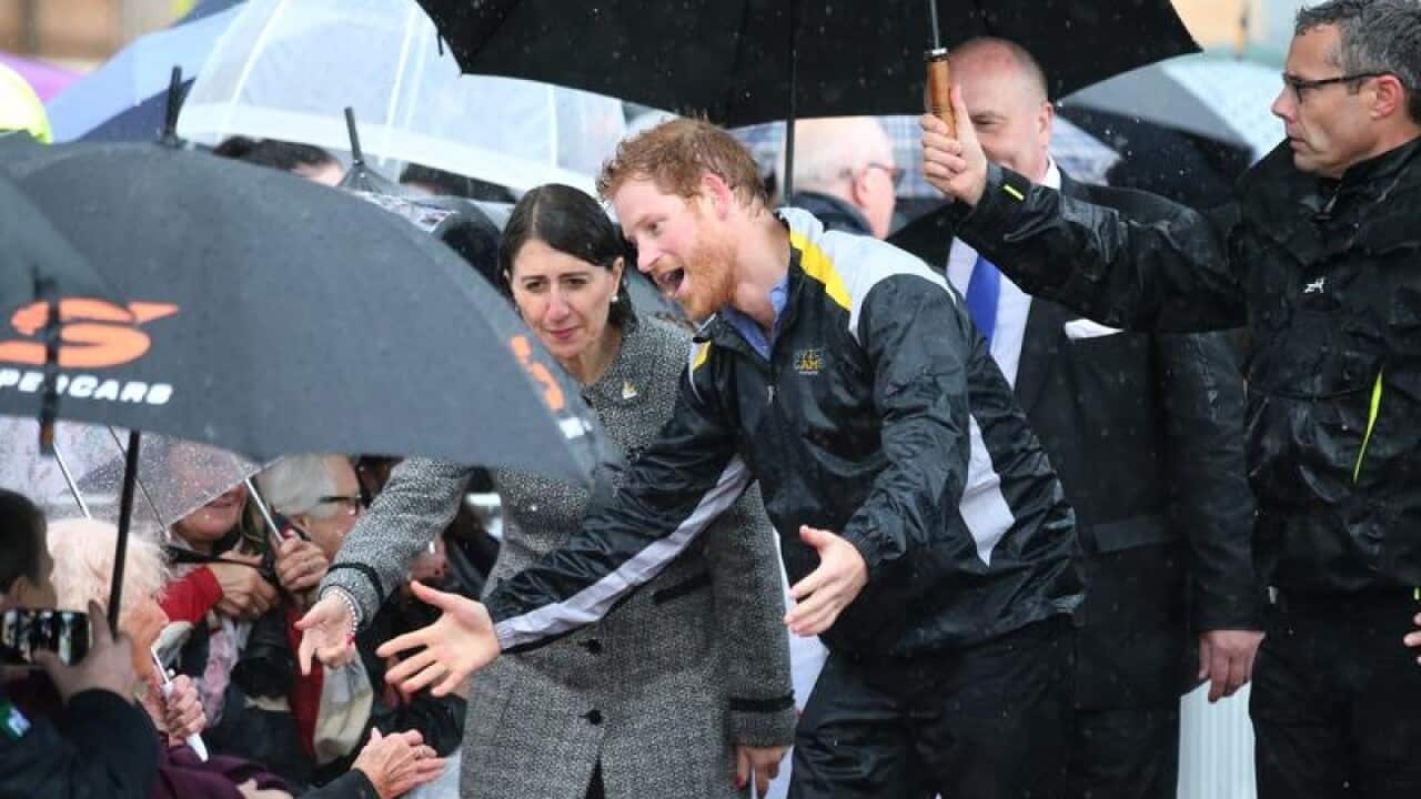 Prince Harry with Gladys Berejiklian during his last visit to Sydney.