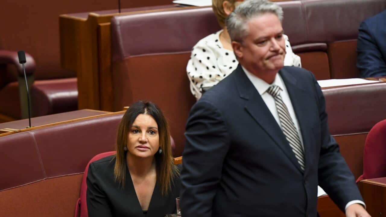 Crossbench Senator Jacqui Lambie and Senator Mathias Cormann. The government has passed the medevac repeal laws with the help of Senator Lambie.
