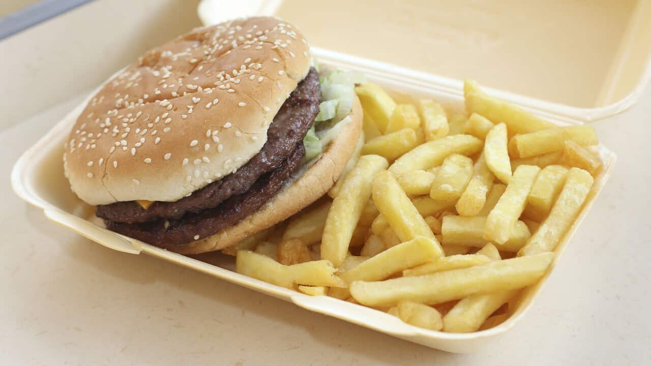 A generic stock photo of a half-pounder burger and chips in a takeaway carton.. Picture date: Wednesday July 9, 2014. Photo credit should read: Philip Toscano/PA Wire