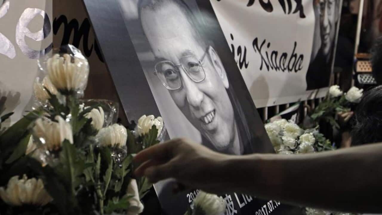 Protesters mourn Chinese Nobel Peace laureate Liu Xiaobo in Hong Kong