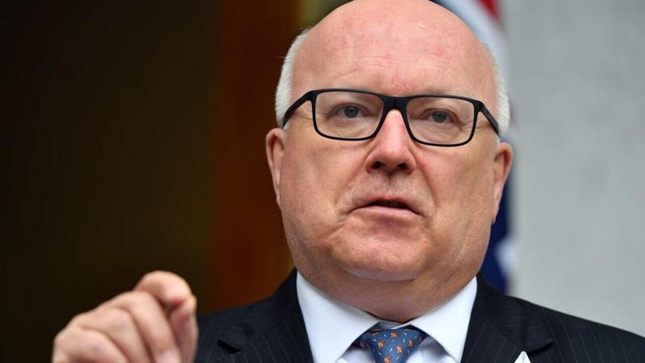 UK High Commissioner George Brandis.