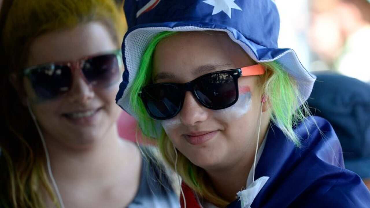 Young women attending the Australian Open tennis in Melbourne