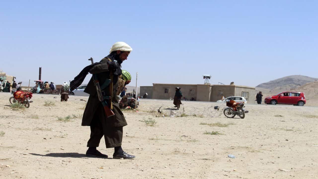 Taliban fighters patrol inside the city of Ghazni, southwest of Kabul, Afghanistan, Friday, 13 August, 2021.