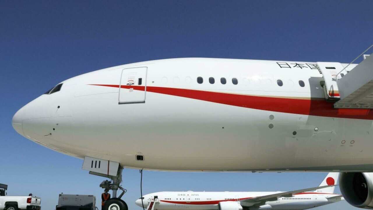 A Japanese man has died mid-flight with a stomach full of cocaine.