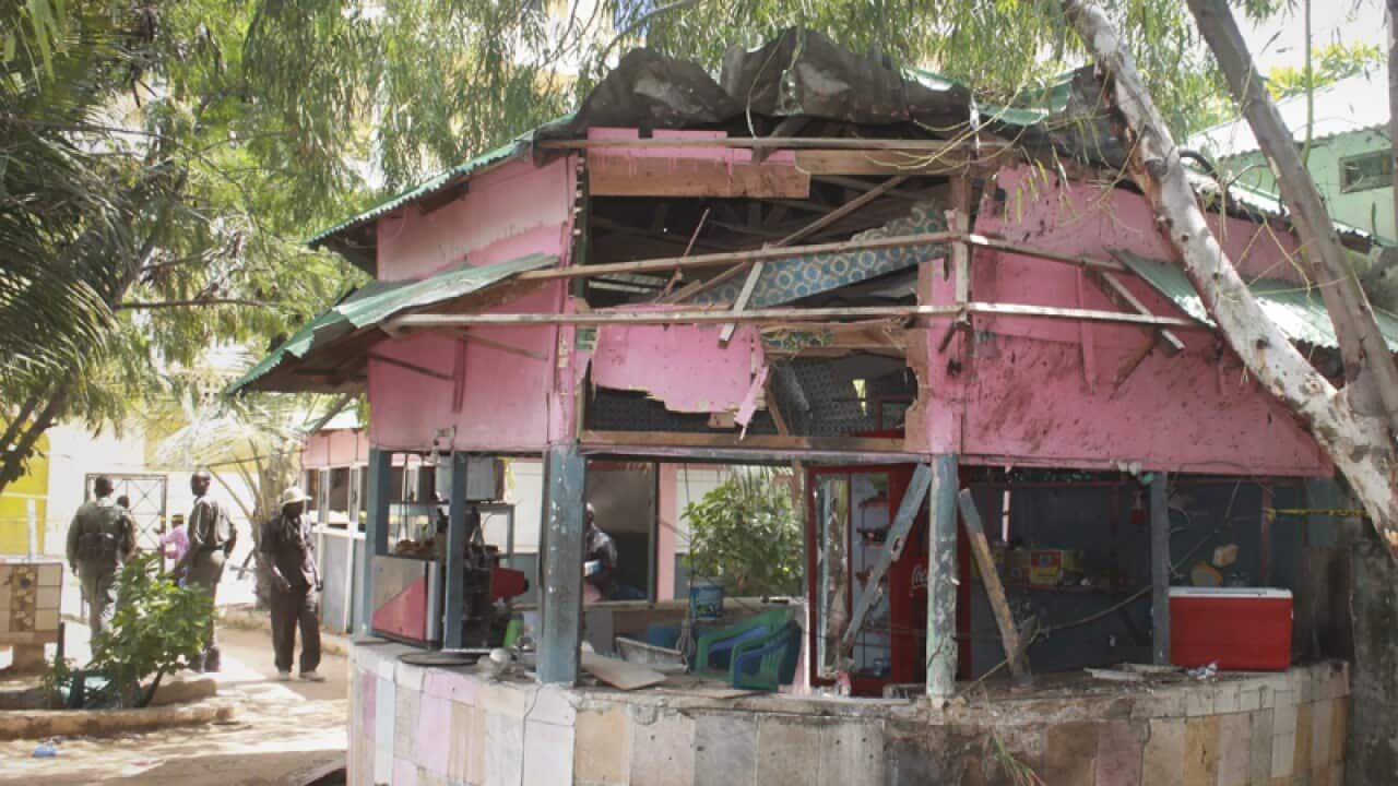 Security officers at the scene of an explosion in Mogadishu
