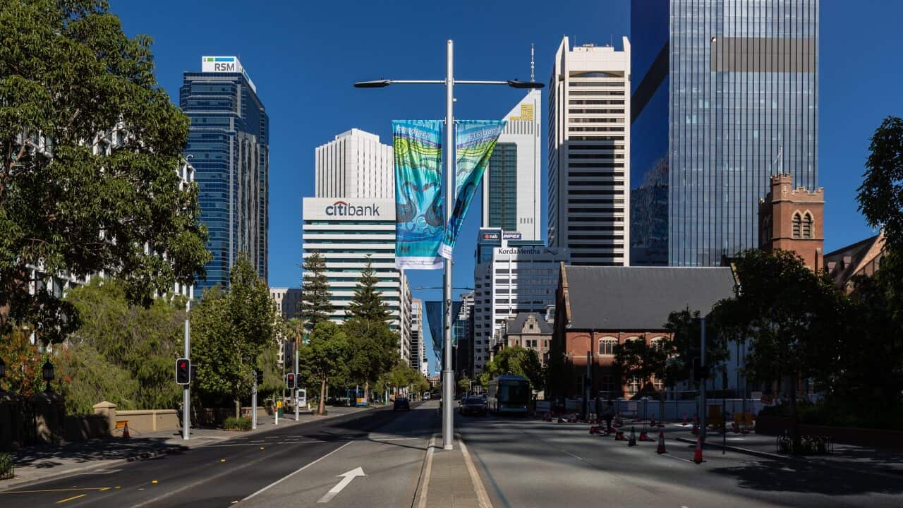A general view of empty streets looking down towards St Georges Terrace in the Perth CBD during the first morning of the lockdown in Perth on Monday.