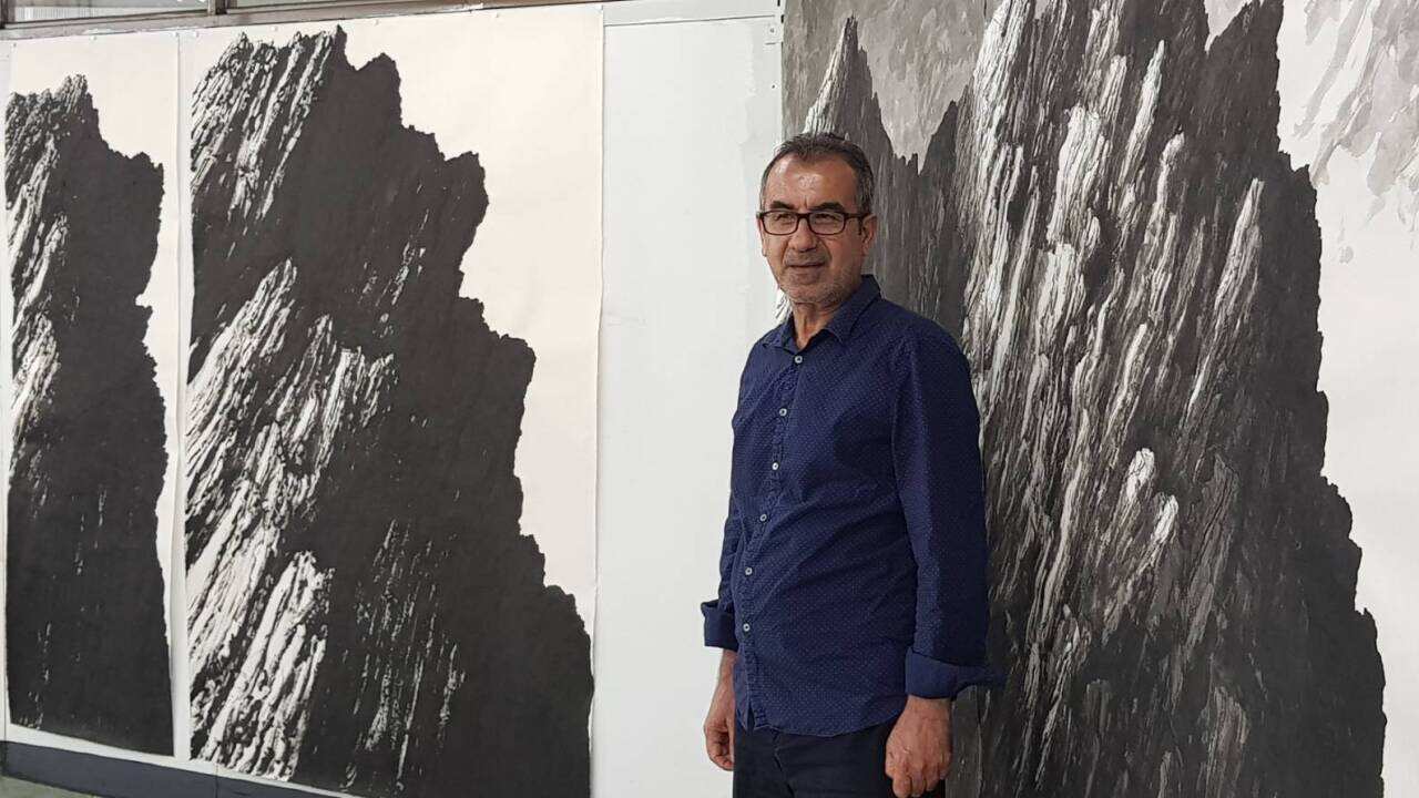 Baxtyar Kaftan at his art exhibit in South Korea