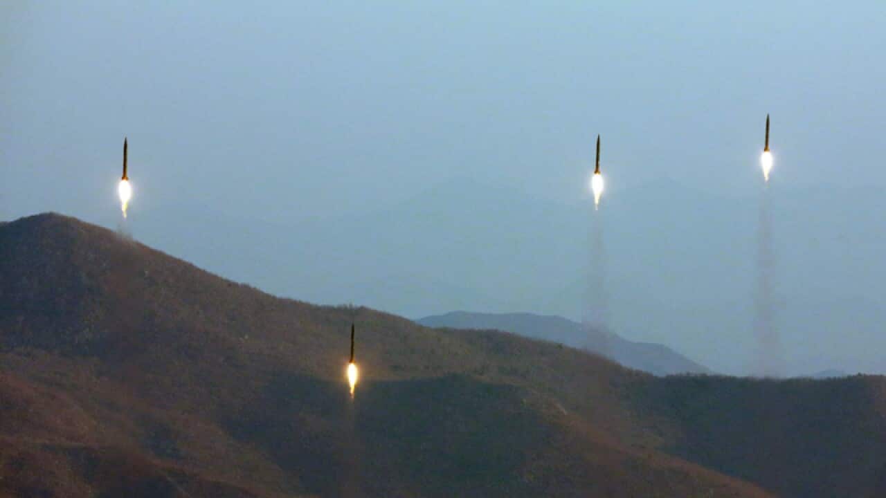 Four projectiles during a ballistic rocket launching drill