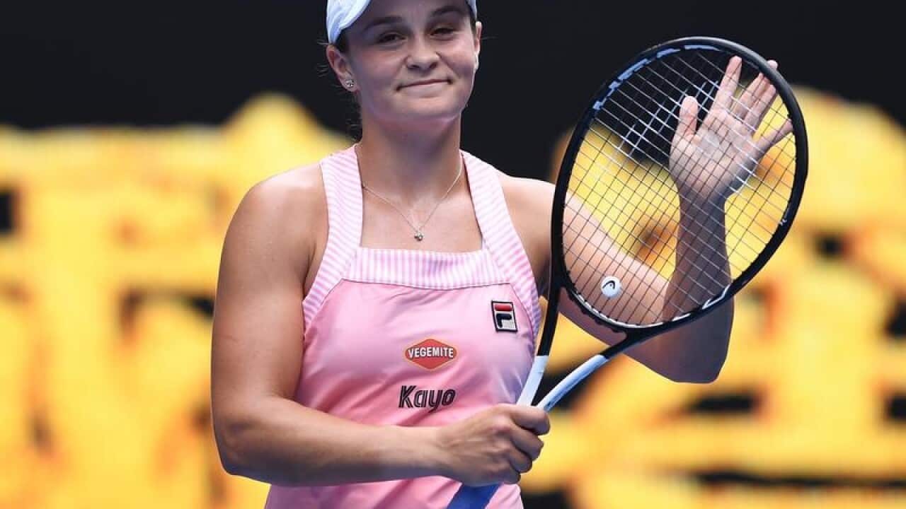 Ashleigh Barty of Australia celebrates after defeating Yafan Wang.