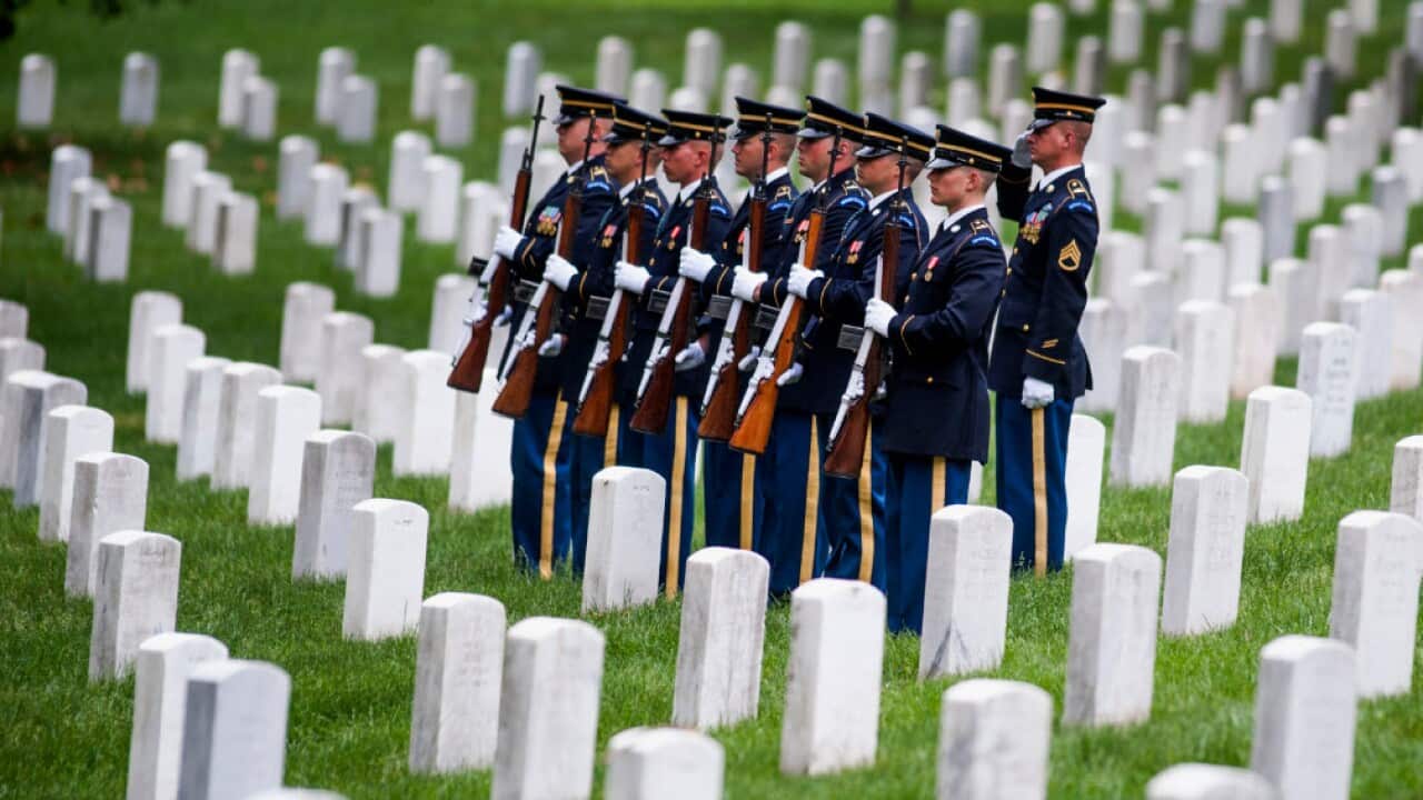 The firing party stands at attention during burial services for Army Pfc. James Holmes of Warren, Ohio, missing from the Korean War (AAP)