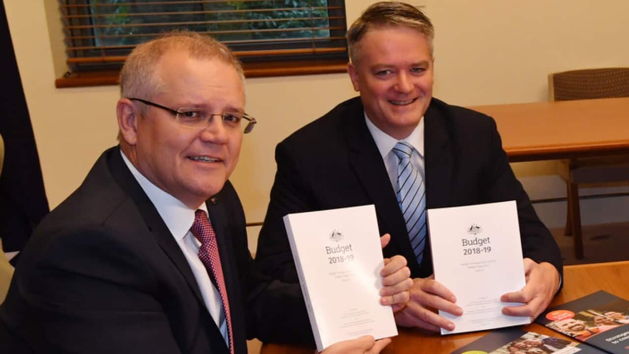Treasurer Scott Morrison and Minister for Finance Mathias Cormann at a picture opportunity for Budget 2018 at Parliament House in Canberra, Tuesday, May 8, 2018. (AAP Image/Mick Tsikas) NO ARCHIVING