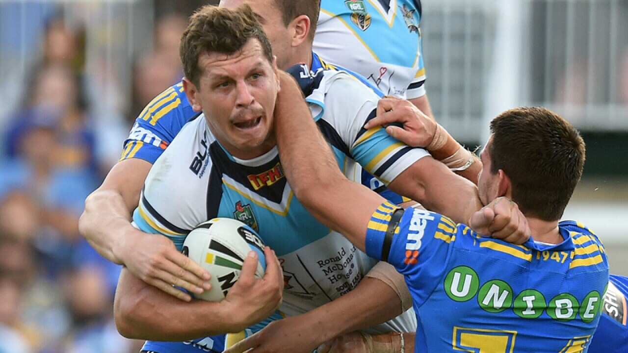 Gold Coast Titans' Greg Bird is tackled