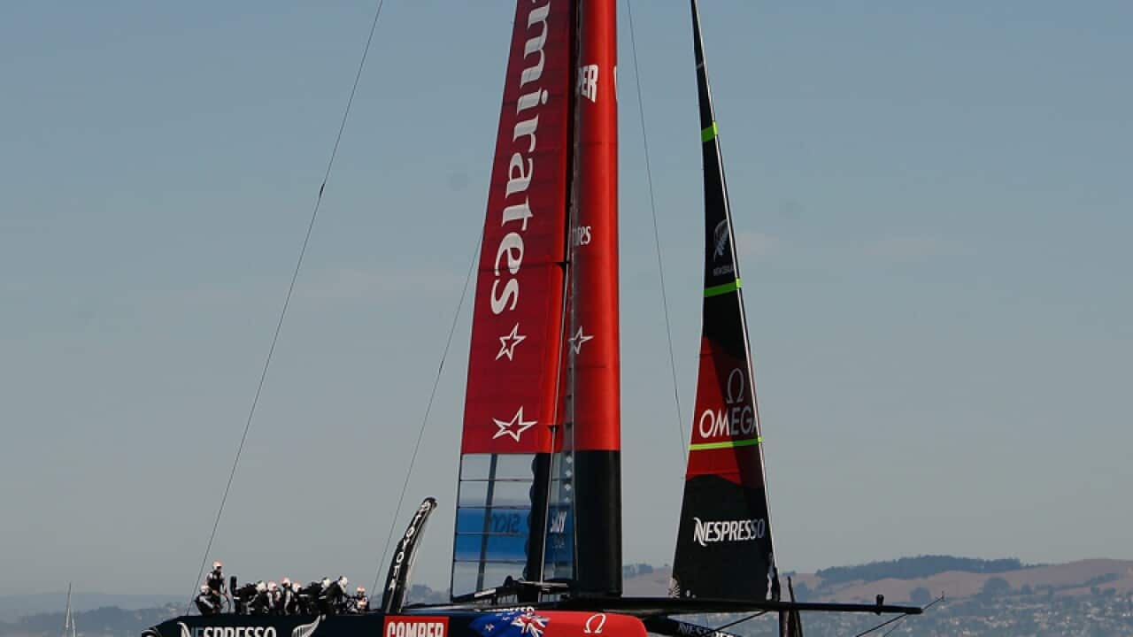 Emirates Team New Zealand sails across the finish line to win race 11