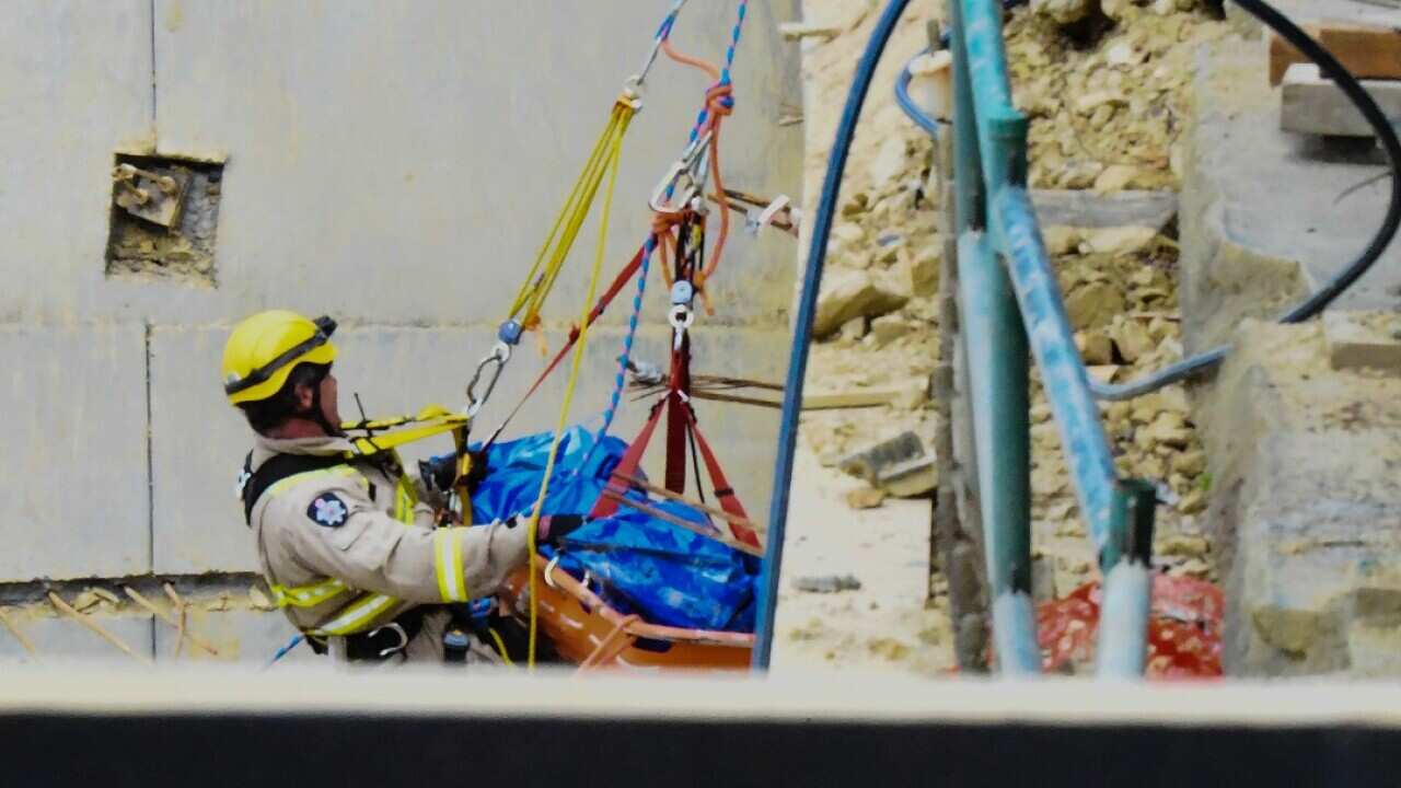 An emergency worker at the scene of the work place accident in Box Hill on Thursday, September 6.