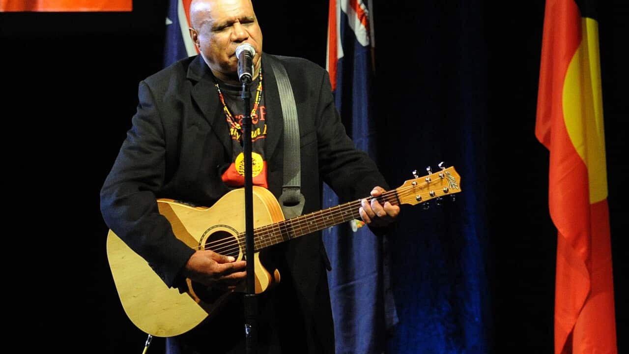 Archie Roach performs at the funeral of Lionel Rose at Festival Hall in Melbourne, Monday, May 16, 2011. Rose was today given a State Funeral as the first ever indigenous Australian to win a world boxing title. (AAP Image/Julian Smith) NO ARCHIVING