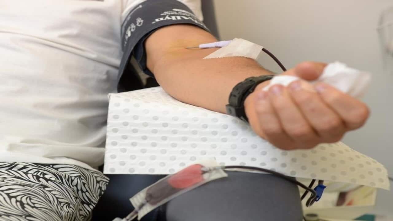 A man donates blood