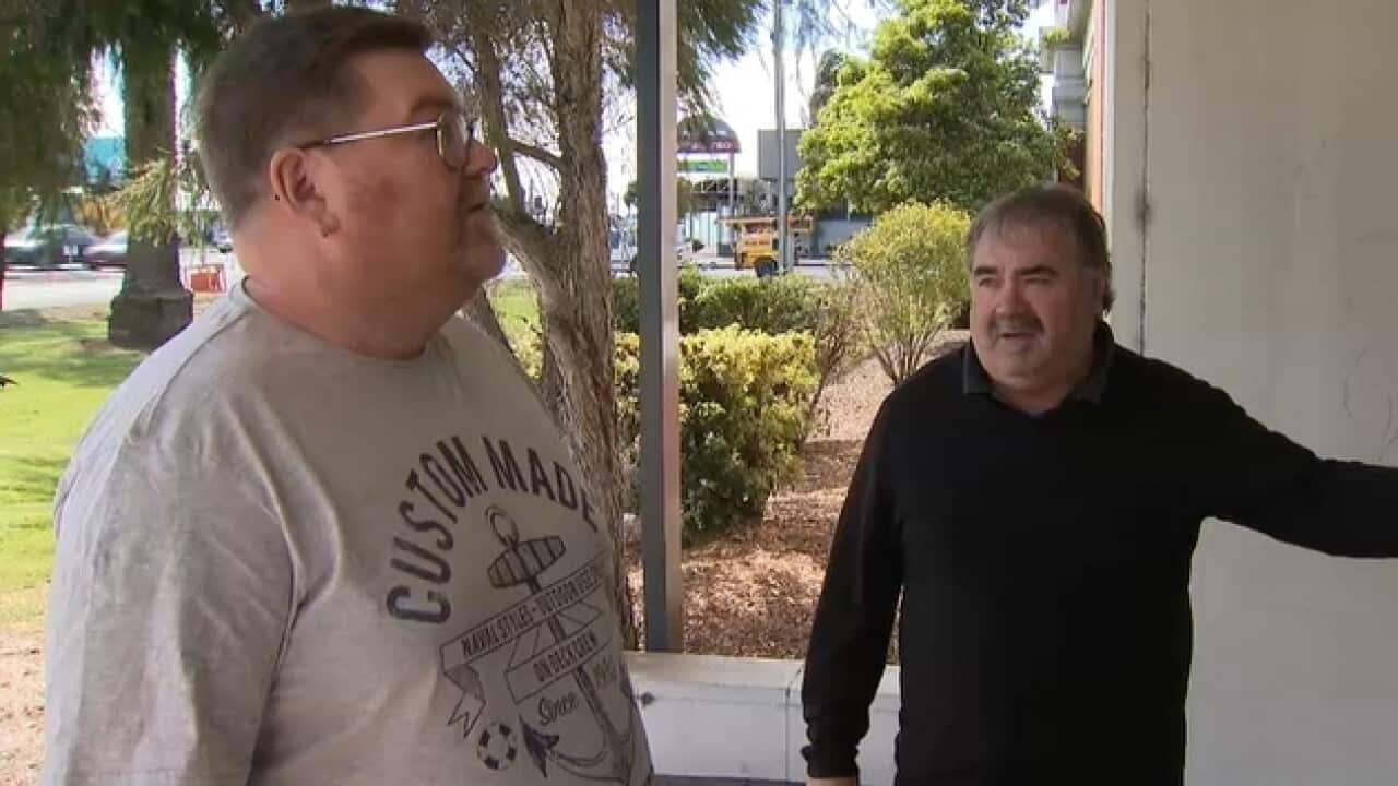 Former Ford employees Tony Anderson, left, and Henry Fuller outside old Ford factory in Geelong