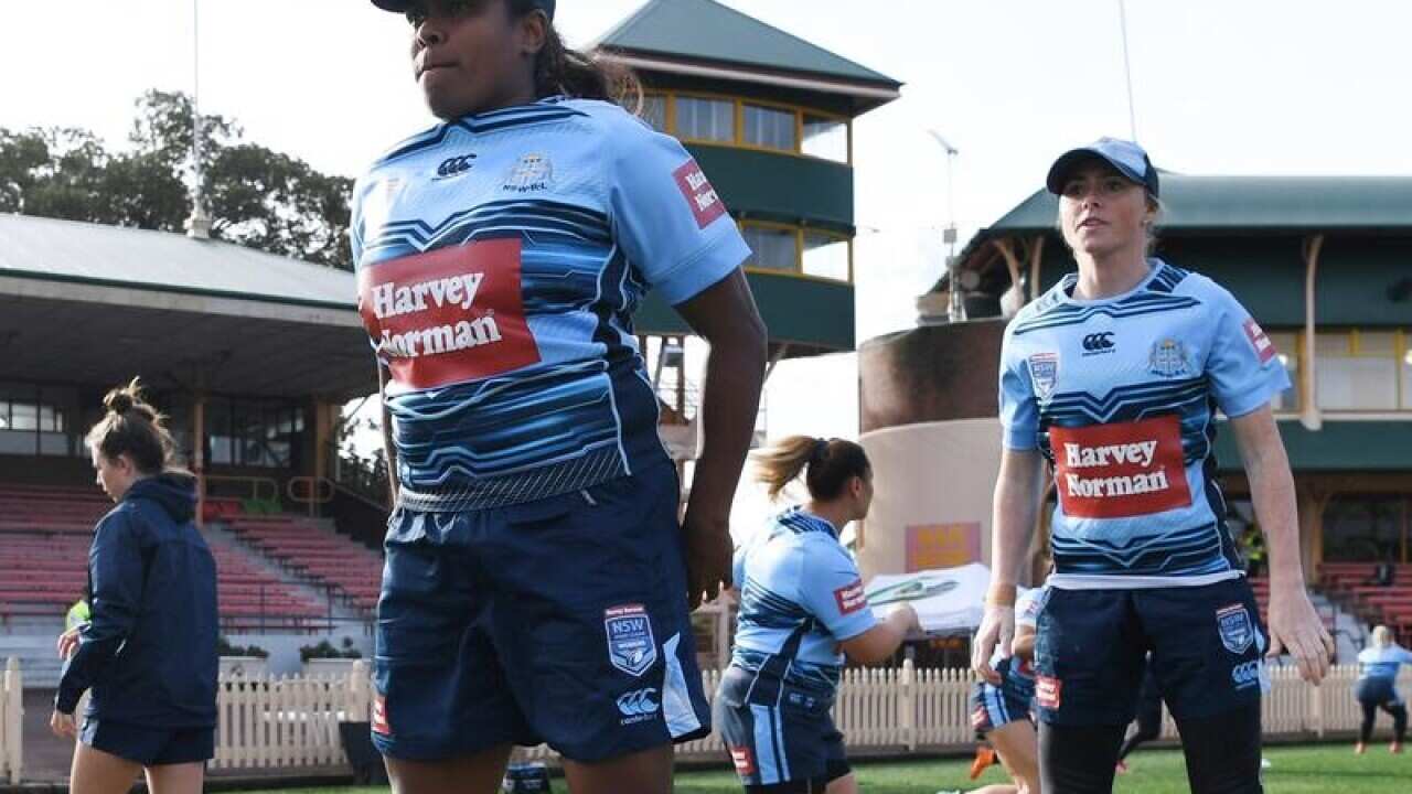 NSW Blues player Lavina O'Mealey (L)