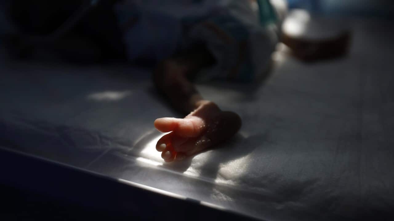 The foot of a malnourished baby is seen as it lies in an intensive care unit of a hospital in Sana'a, Yemen, 19 November 2019.