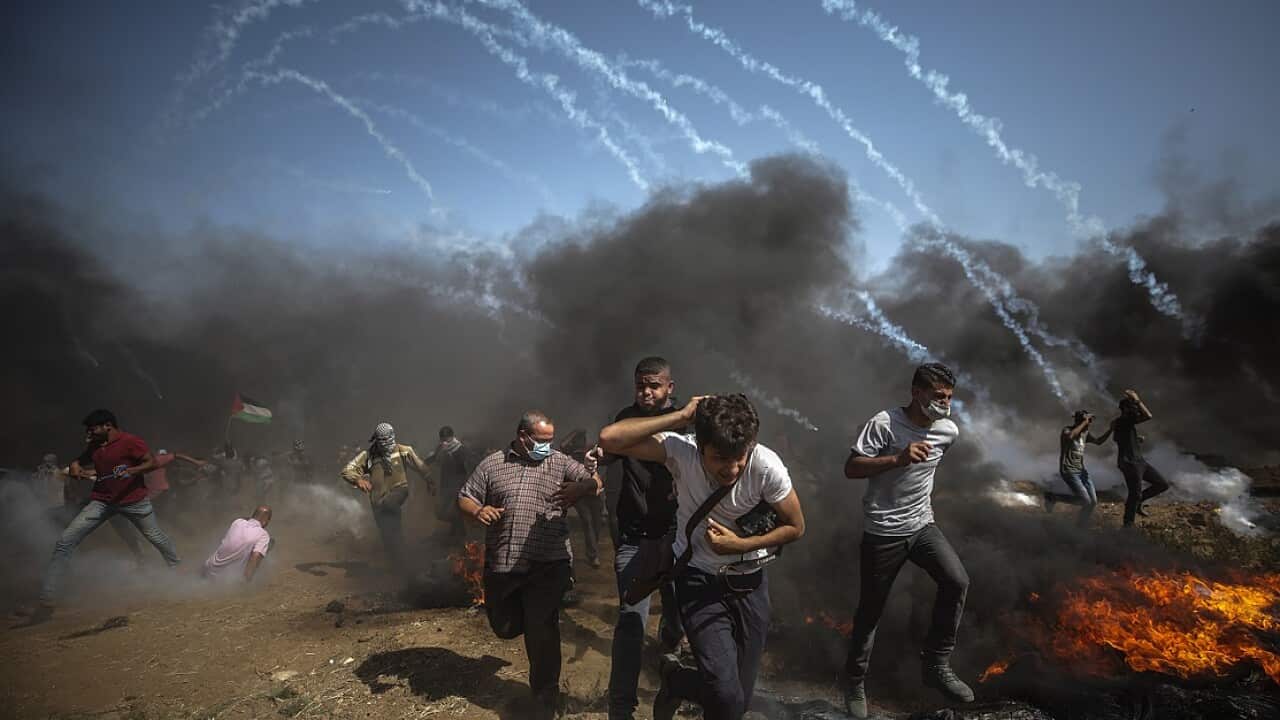 A UN resolution deplores Israel's use of "excessive, disproportionate and indiscriminate force".