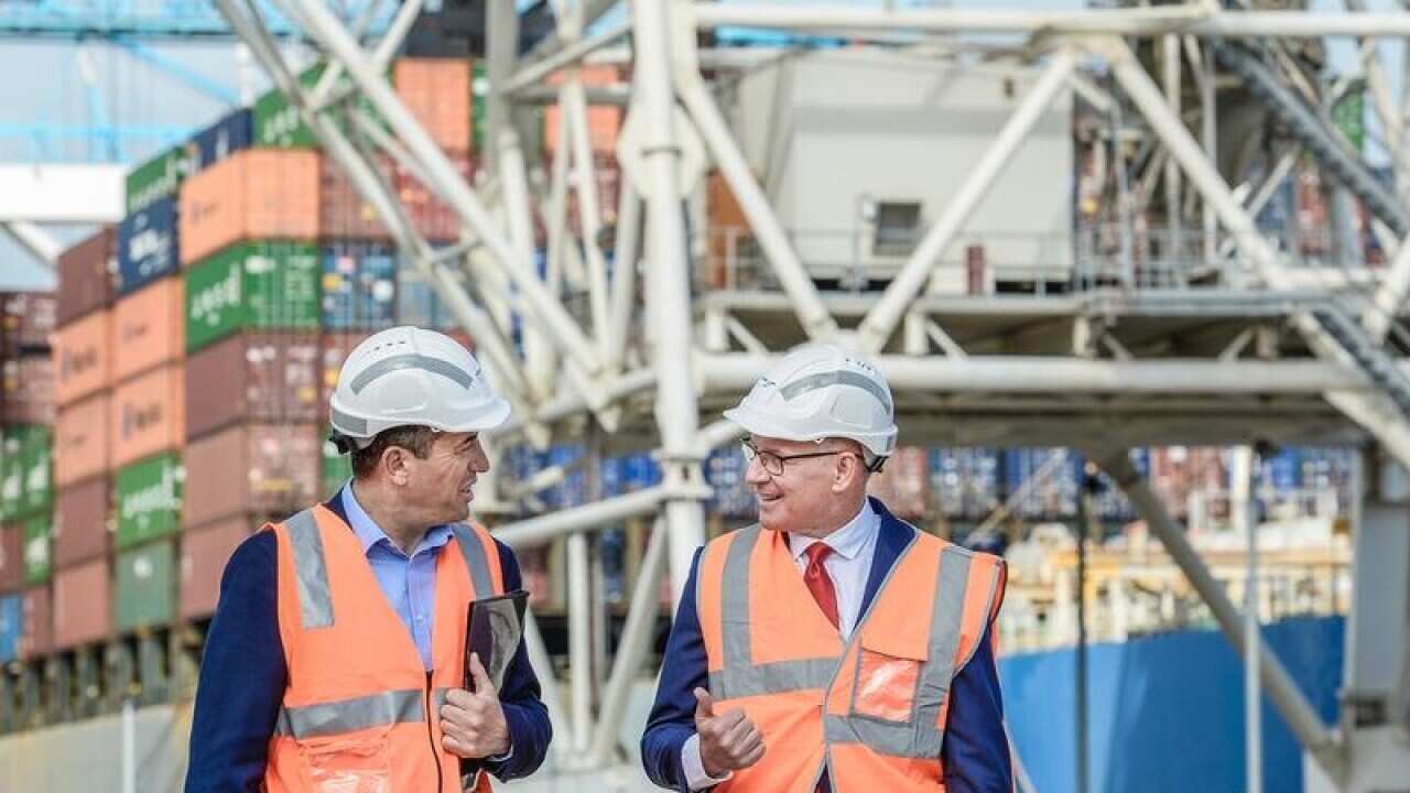 Jay Weatherill (right) and Tom Koutsantonis at Flinders Port.