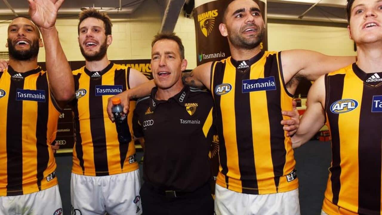 Coach Alistair Clarkson of the Hawks (centre)