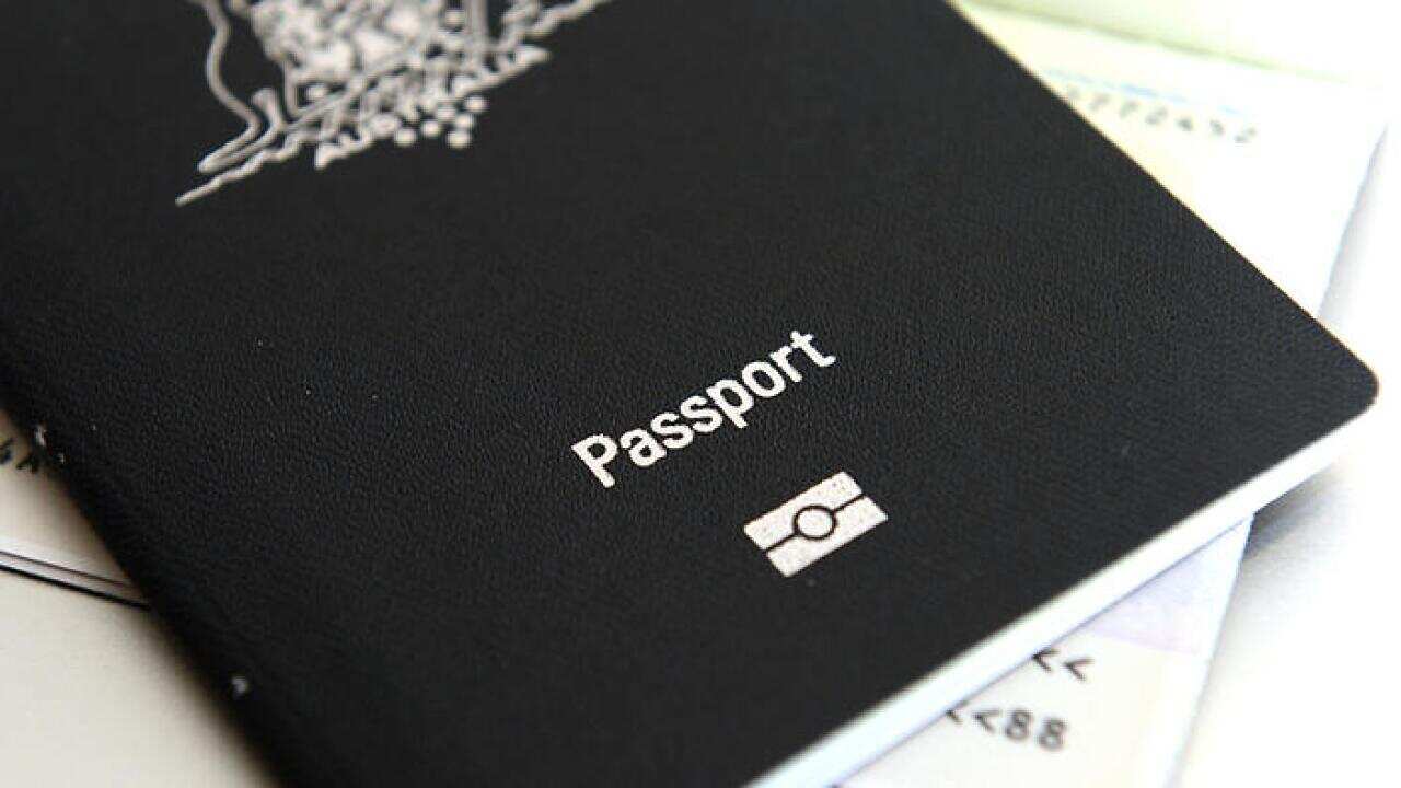 An Australian passport pictured in Brisbane, Thursday, July 25, 2013. (AAP Image/Dan Peled)