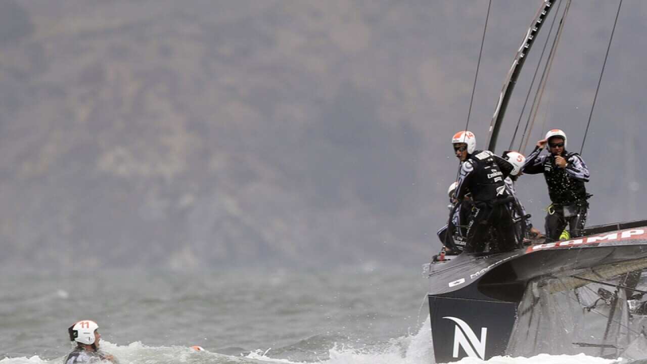 Team NZ damaged; men overboard in win