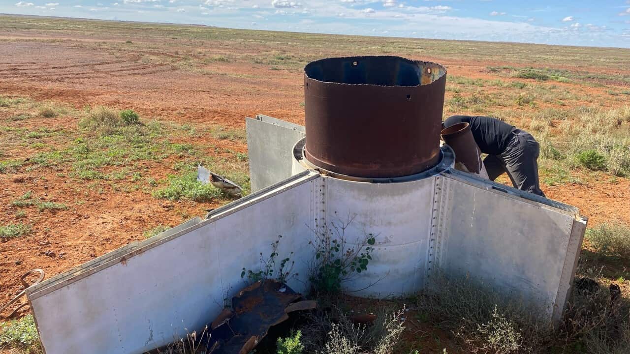 A rocket believed to have been test fired in the 1950s lies in the South Australian outback (SBS).jpg