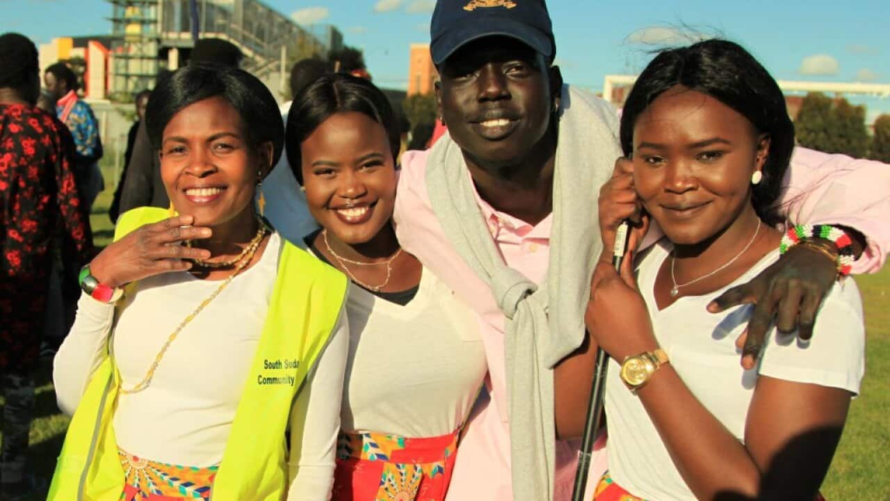Mama Abiol Atem, her daughter and some of the young people she was mentoring