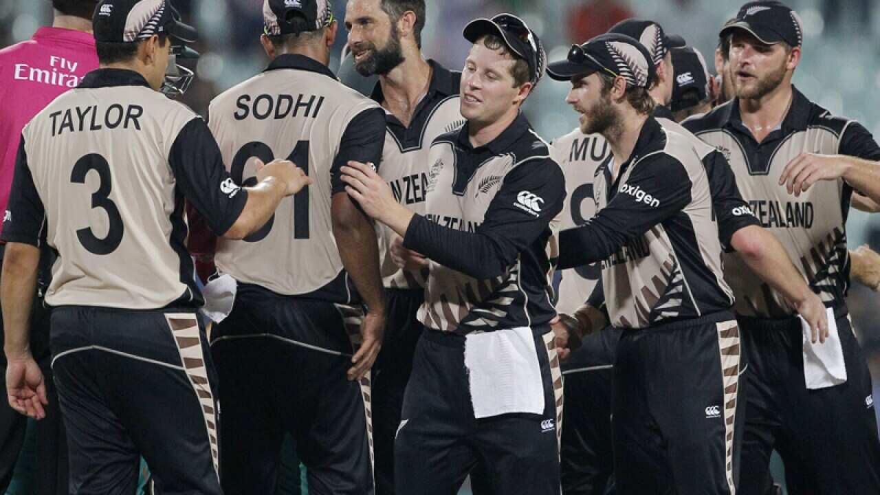 New Zealand cricketers celebrate after defeating Bangladesh