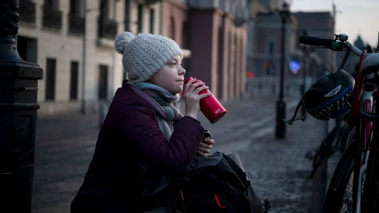 Greta Thunberg on her way to a demonstration calling for climate action at the Swedish Parliament in Stockholm.