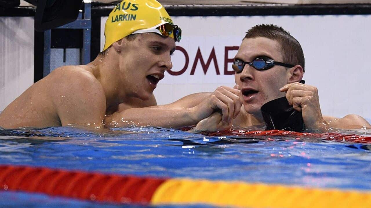 USA's Ryan Murphy celebrates with second placed Australian Mitch Larkin after he won the men's 200m backstroke final.